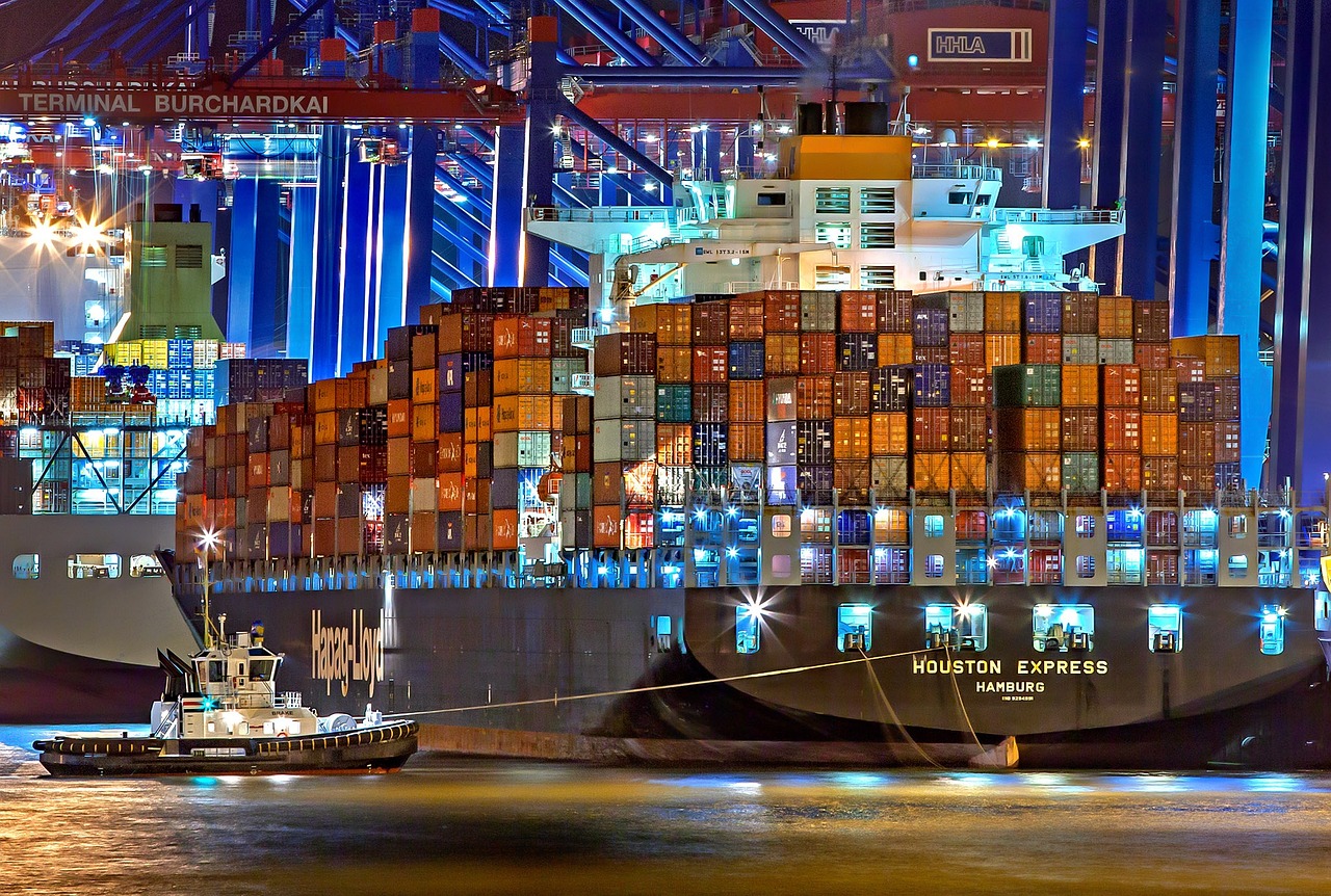 Container vessel alongside a terminal berth with gantry cranes